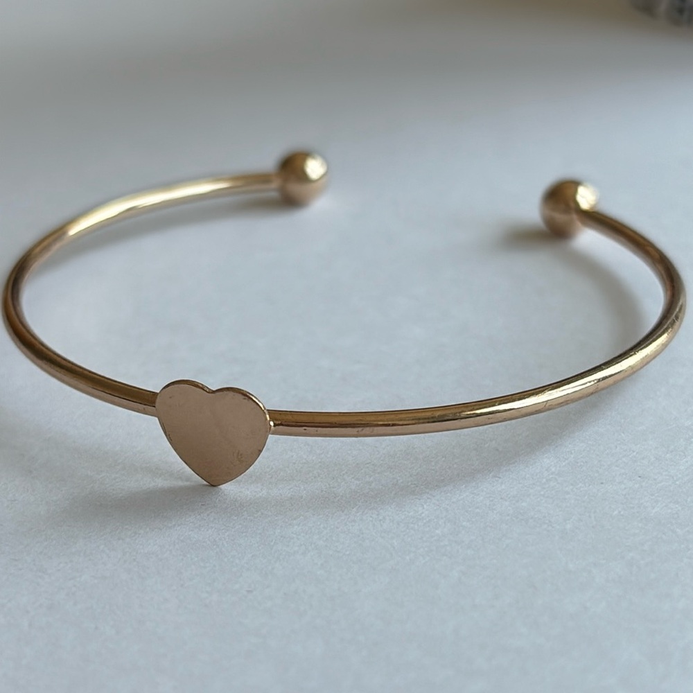 Heart cuff bracelet in gold tone